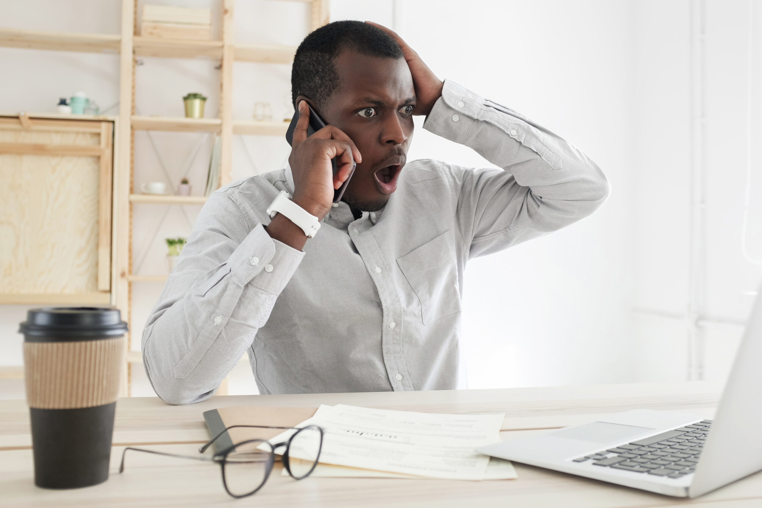 Stressed FSBO seller overwhelmed by paperwork and calls